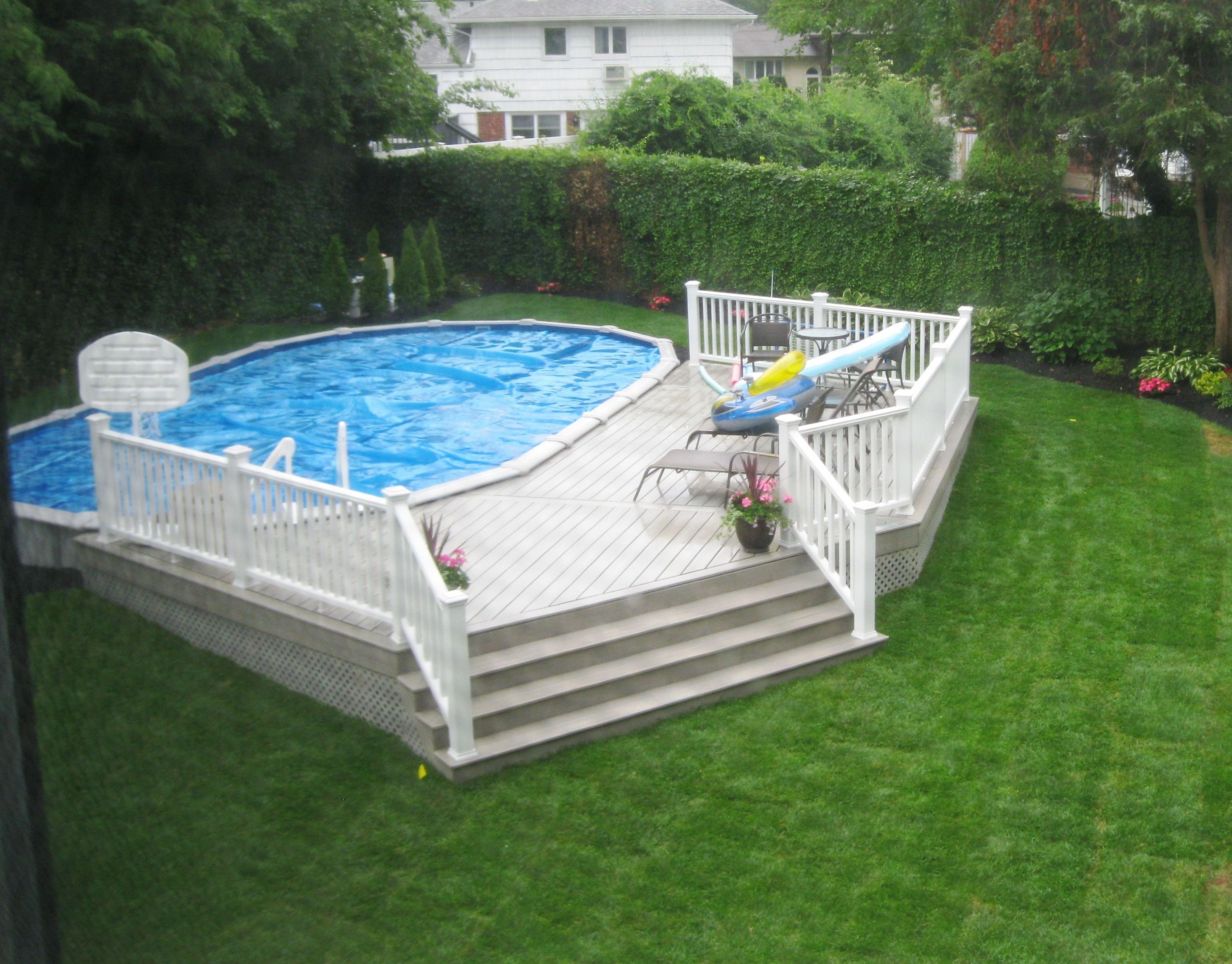 18X33 Above Ground Pool
 18x33 semi inground pool with deck