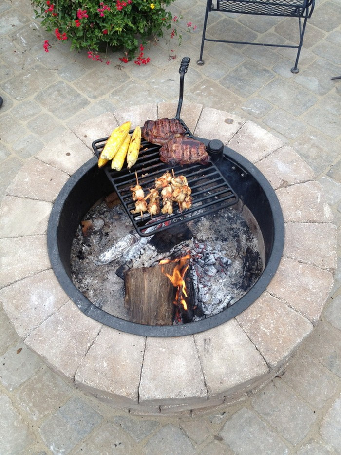 Build Your Own Outdoor Firepit
 Build a fire pit with cooking grill in your backyard