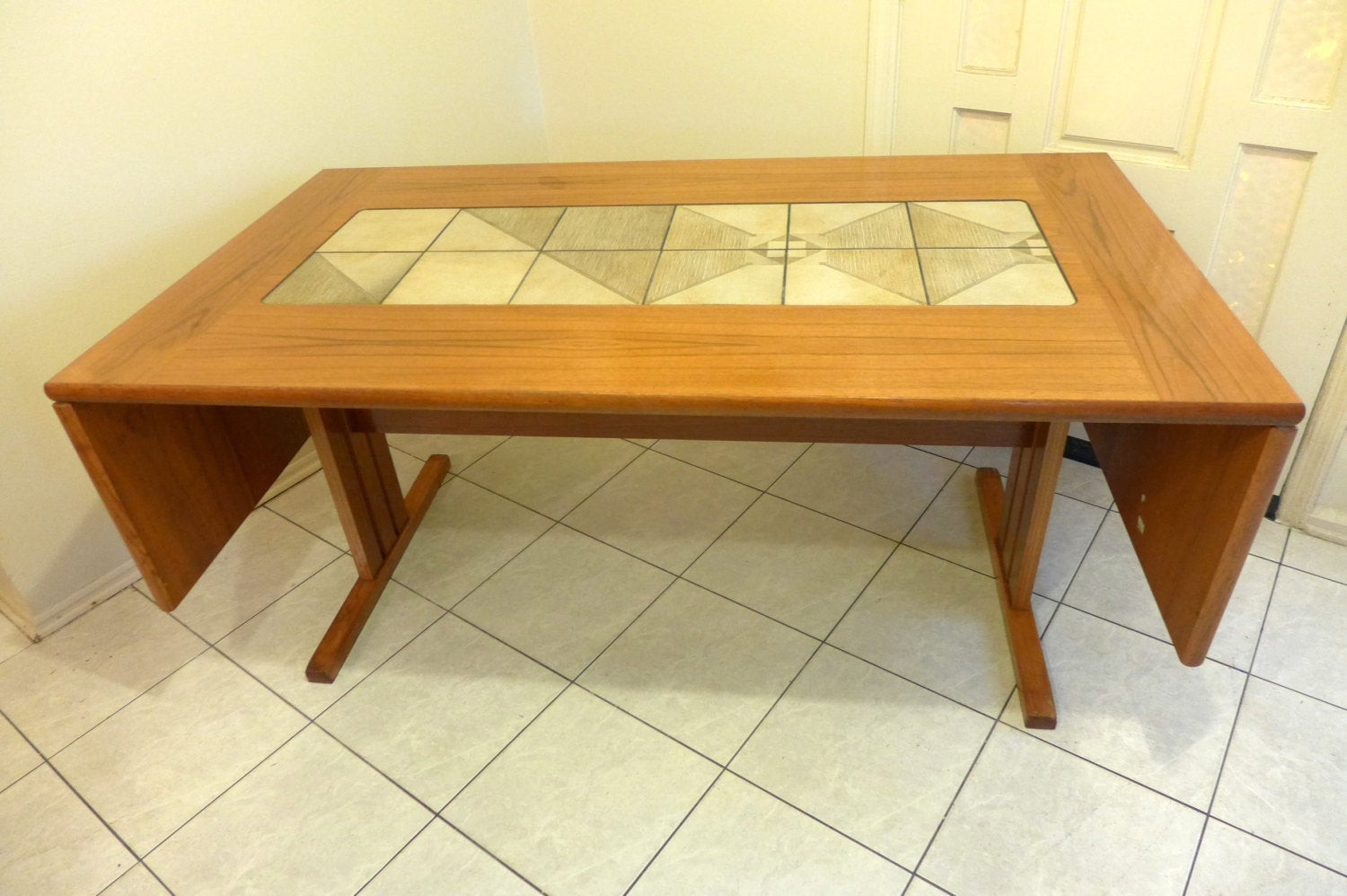 Ceramic Tile Kitchen Tables
 Ceramic tile top dining table by Jacques Adnet at 1stdibs