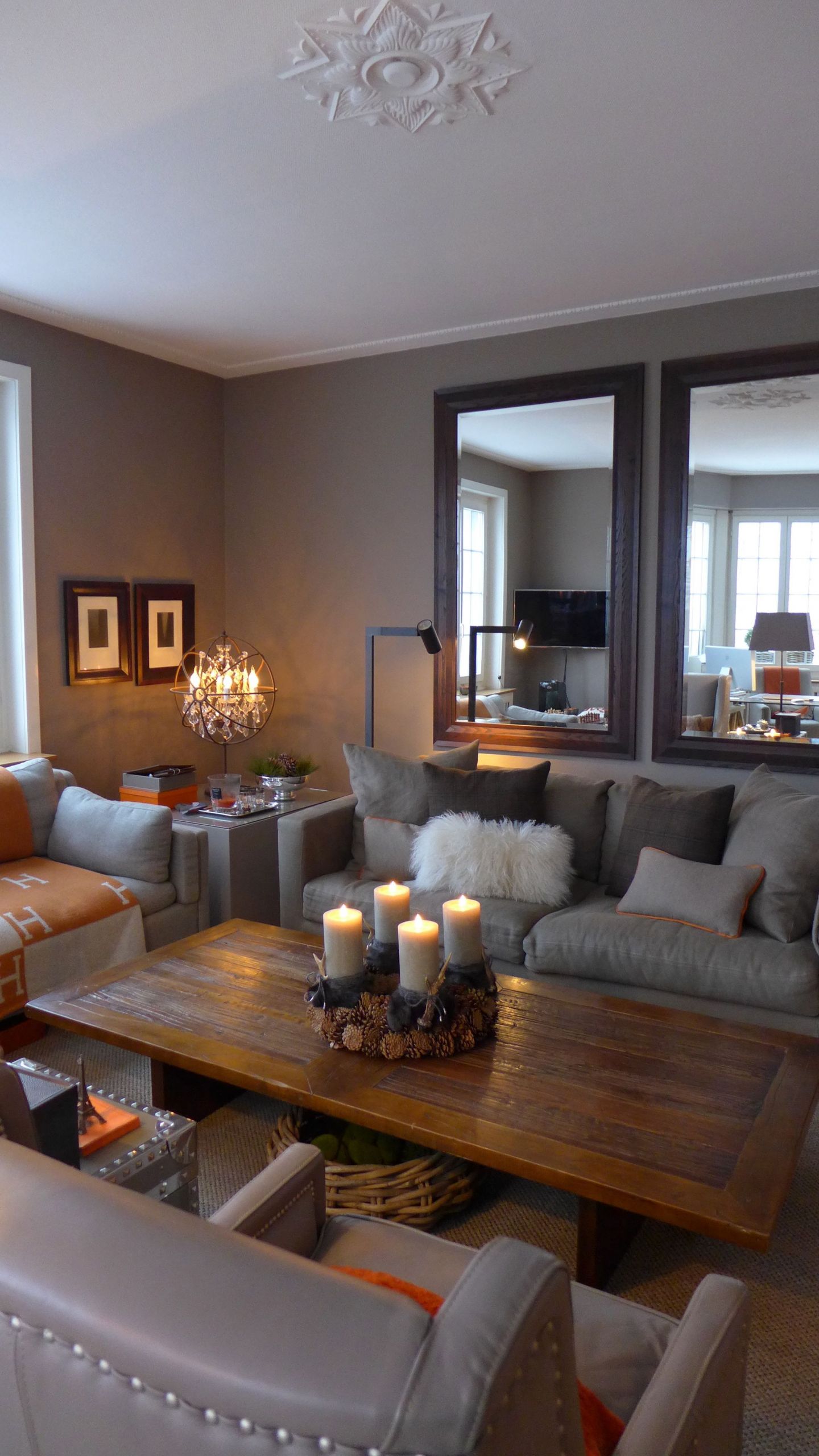 Cozy Living Room Colors
 Warm and cozy living room in taupe with a touch of orange