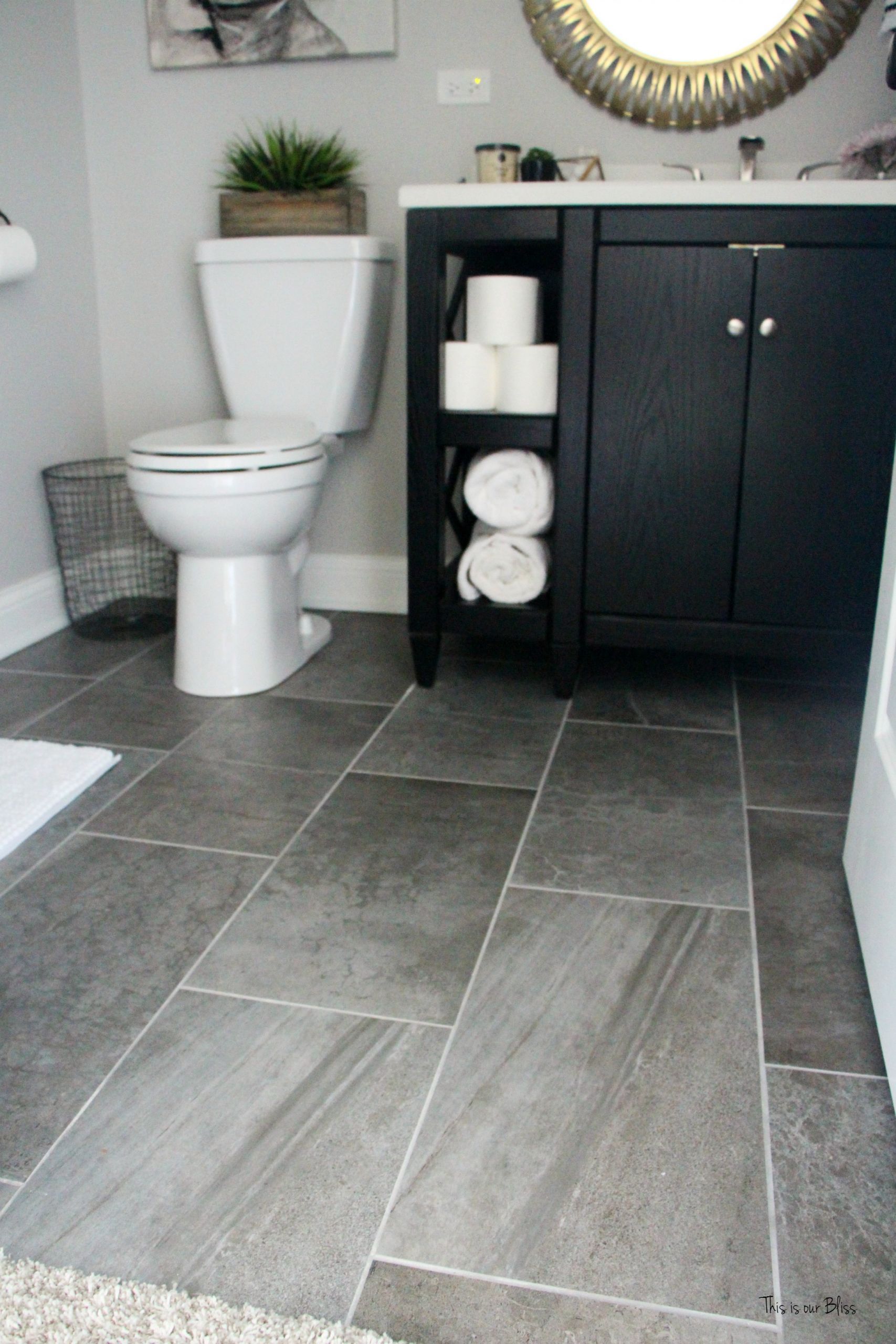 Grey Bathroom Floor Tiles
 How to Create a Neutral Glam Basement Bathroom
