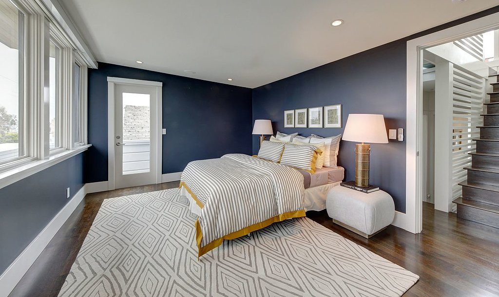 Navy Bedroom Walls
 Aside from the beautiful navy blue walls this bedroom