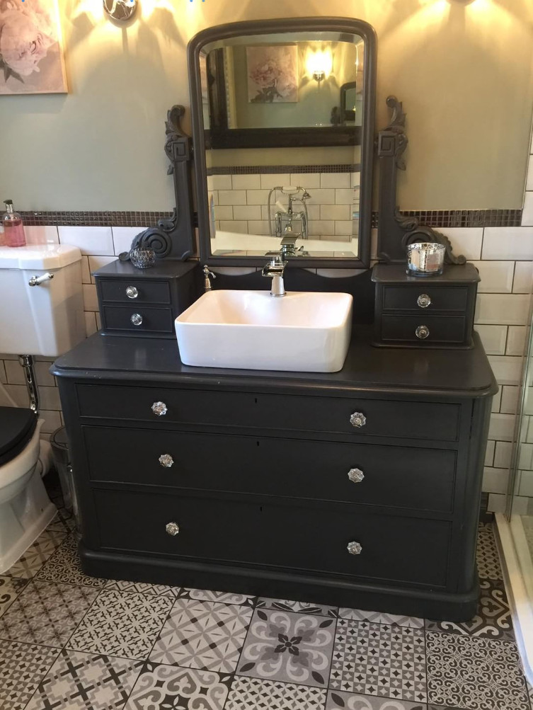 Old Dresser Bathroom Vanity
 This vintage dresser has been upcycled into a beautiful
