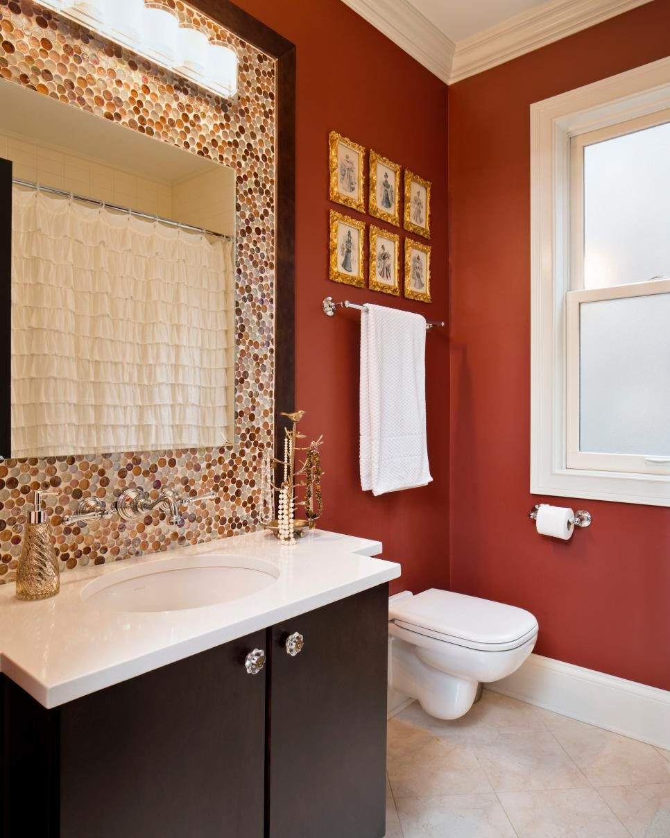 Orange And Brown Bathroom Decor
 Rust orange and brown dominate the color scheme in this