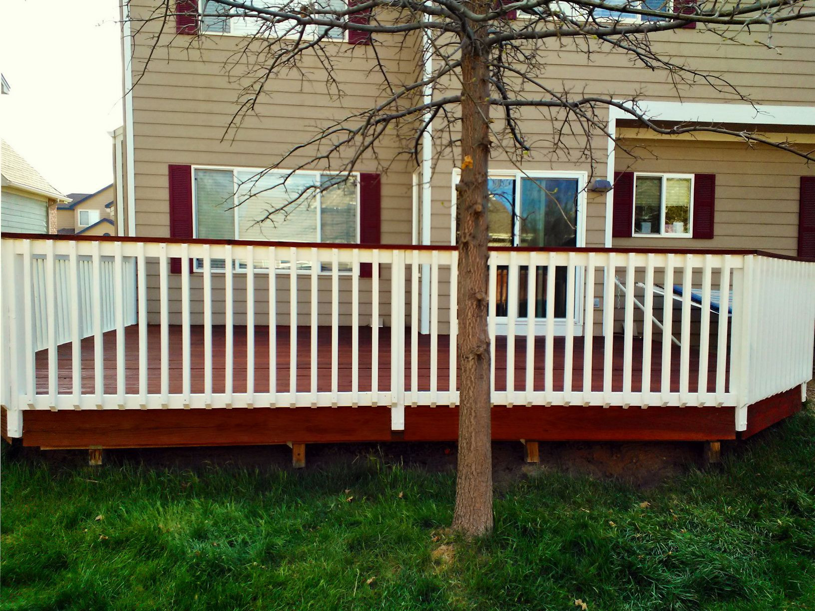 Painting Deck Railing
 A plete deck restore stained with TWP Rustic and white