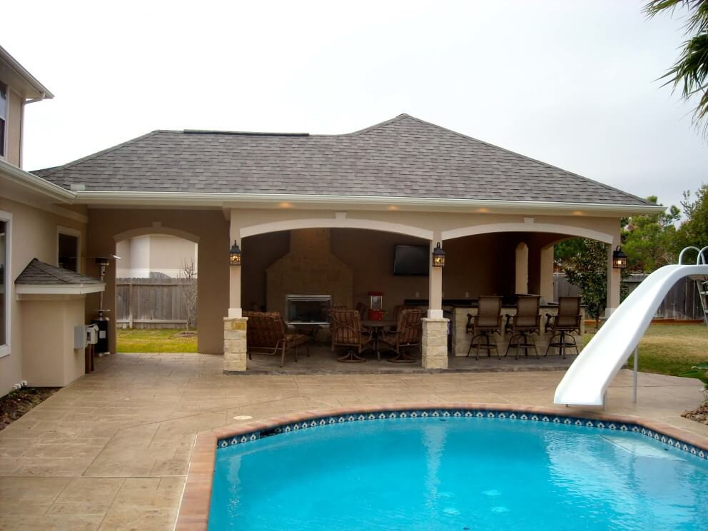 Pool With Outdoor Kitchen
 Pool House With Outdoor Kitchen & Fireplace In Cypress