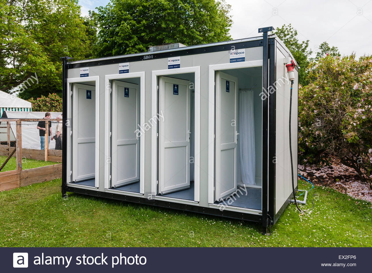 Portable Bathroom With Shower
 Portable shower unit with four individual showers Stock