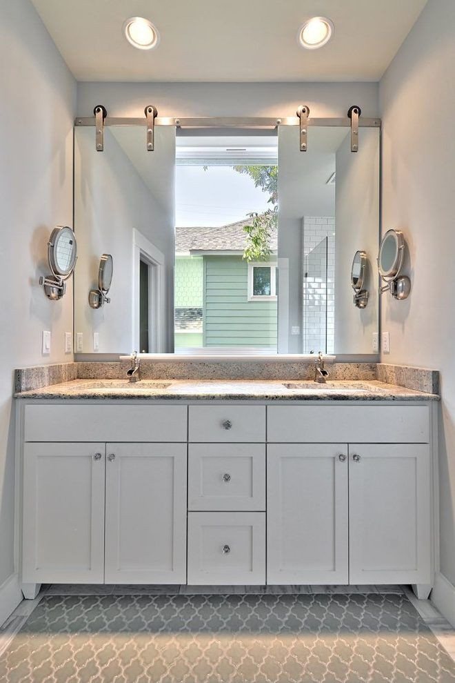 Recessed Lighting Over Bathroom Vanity
 mirror over window bathroom transitional with two sinks