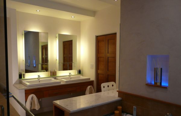 Recessed Lighting Over Bathroom Vanity
 Backlit vanity mirrors look all the more beautiful with