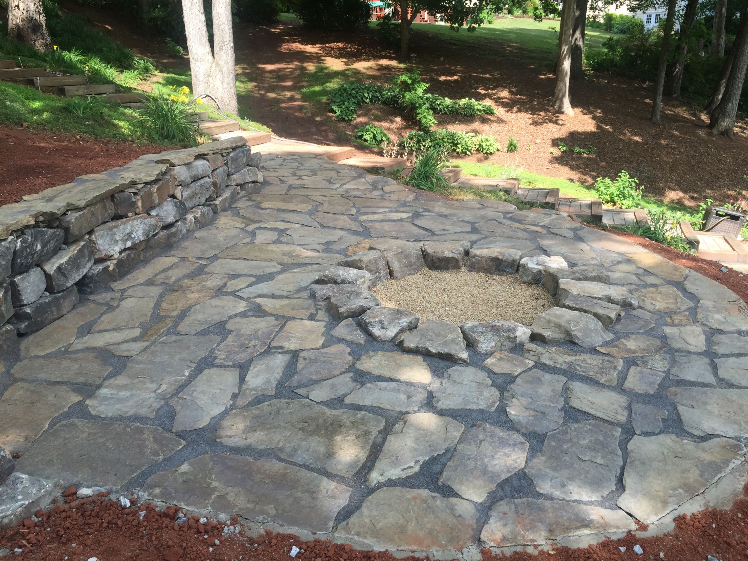 Rock Patio With Fire Pit
 Flagstone Patio & Fire Pit Installed for Seneca Customer