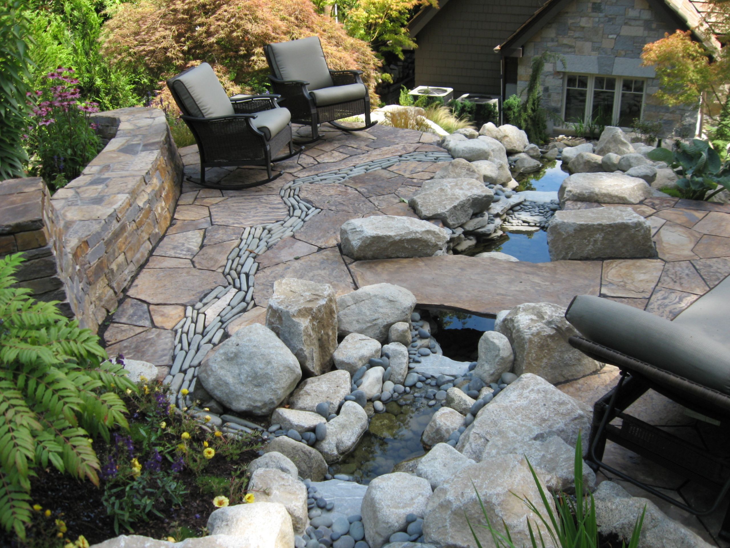 Terrace Landscape Stone
 Before and After – Patio with Stone River and Curved Stone