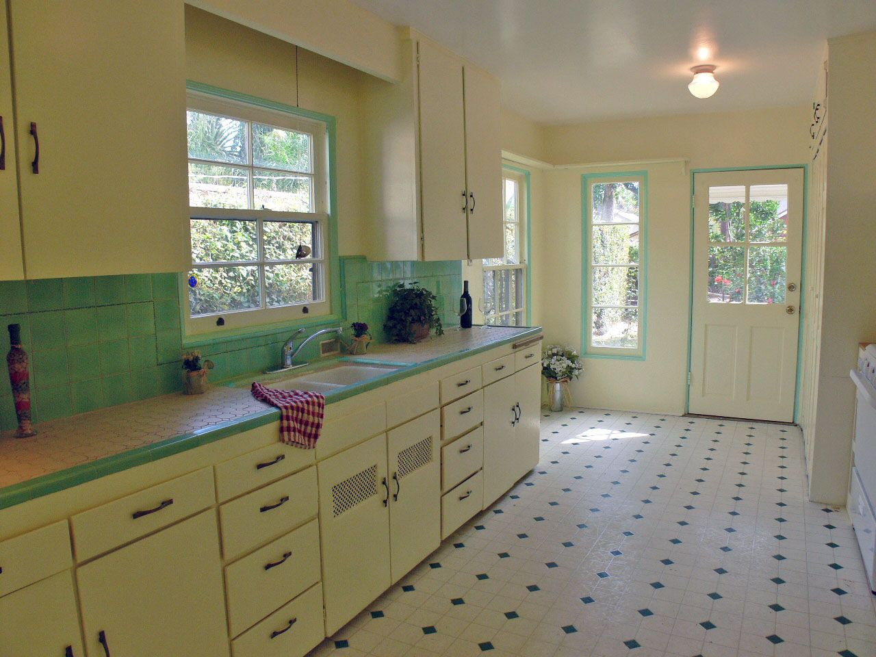 Vintage Kitchen Floor Tile
 Darling kitchen with original honey b tile countertops