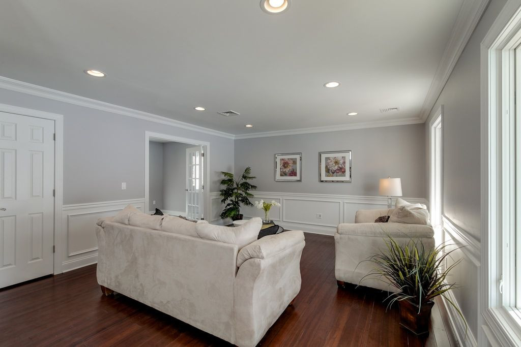 Wainscoting Ideas For Living Room
 Living Room with High ceiling & Crown molding in